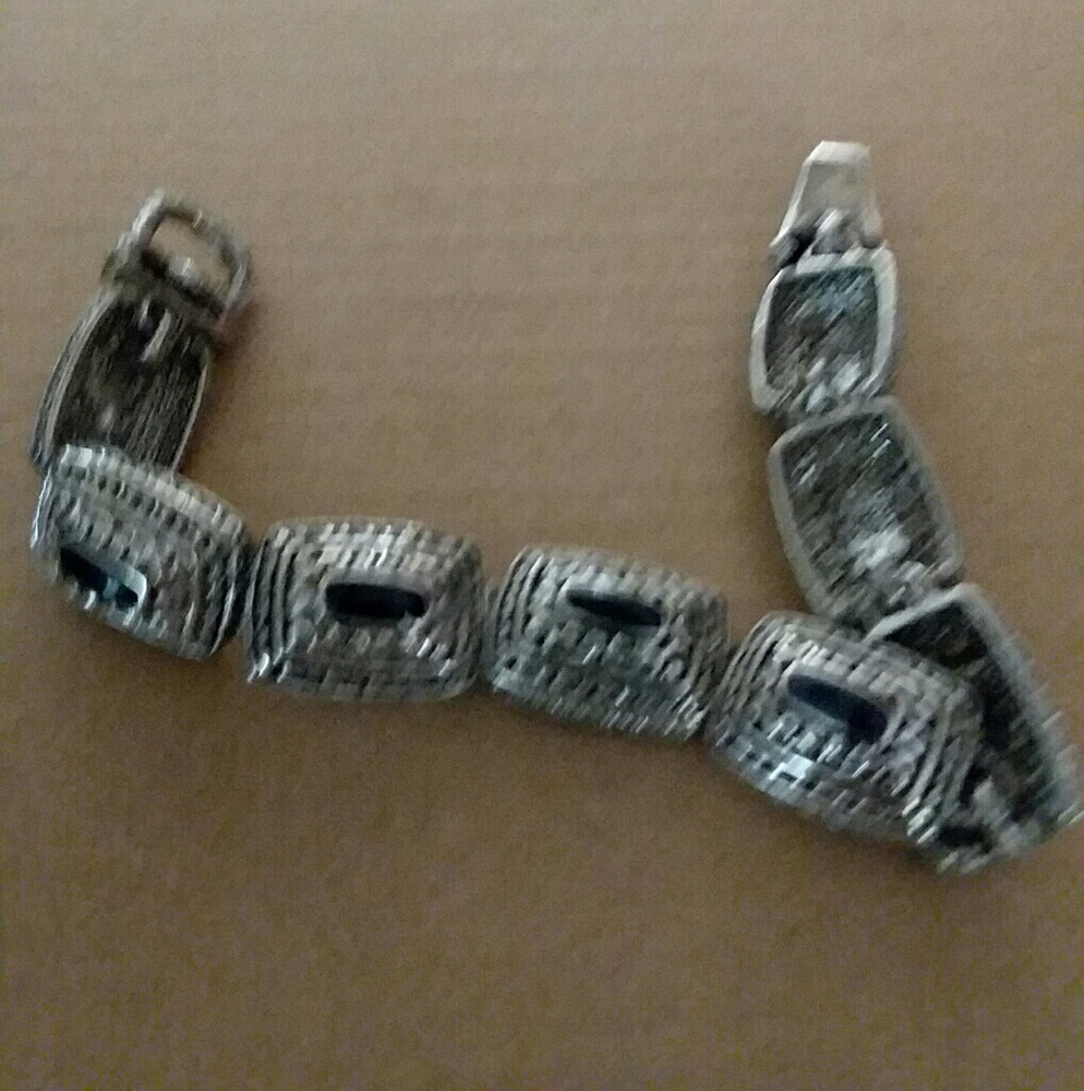 Black onyxs in silver bracelet
